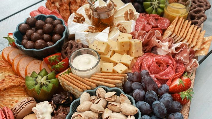 Cheese Board Essentials: Must-Have Cheeses, Accompaniments, and Presentation Tips