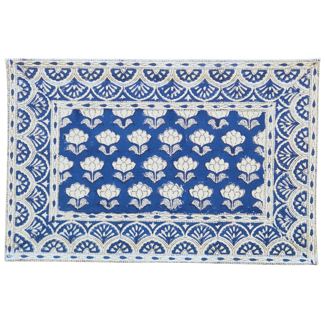 Blue and white Indian block print cotton placemat with floral design, Lake Palace collection.
