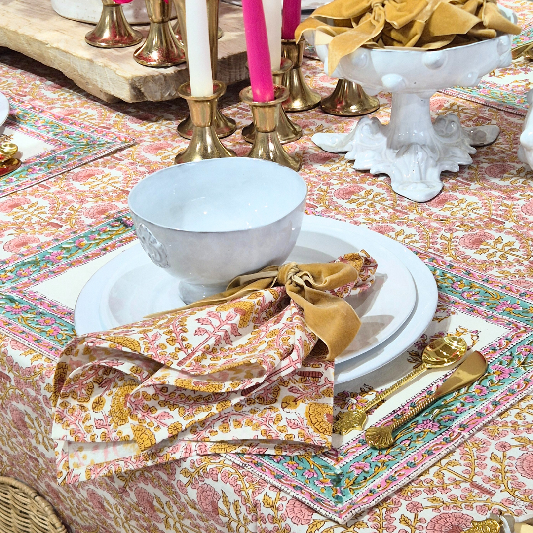 Handmade floral block printed placemat styled on a table setting, 100% cotton artisan table linen.