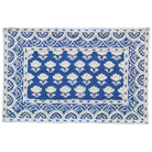 Blue and white Indian block print cotton placemat with floral design, Lake Palace collection.
