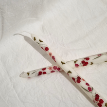 Rosh-Hashanah-Shana-Tova white candles with sweet apple print, crossed