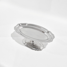 Silver decorative object on a white background