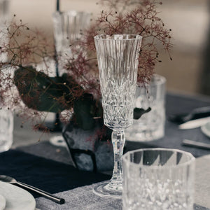 Clear Acrylic Champagne Glass, on table